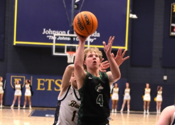 Seniors Sizzle as Huskies Bite Buccaneers