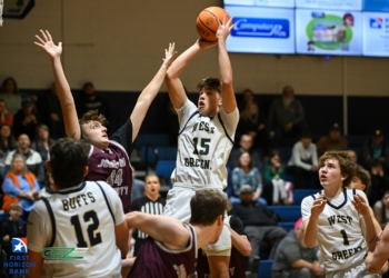Red-Hot Start Carries Buffs To Win Over Johnson County; Cold Finish Dooms Lady Buffs