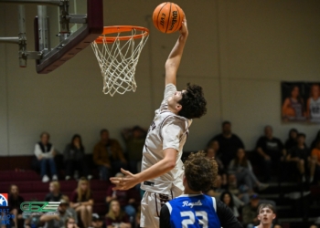 Rebels Depose Royals With 65-41 Region Win