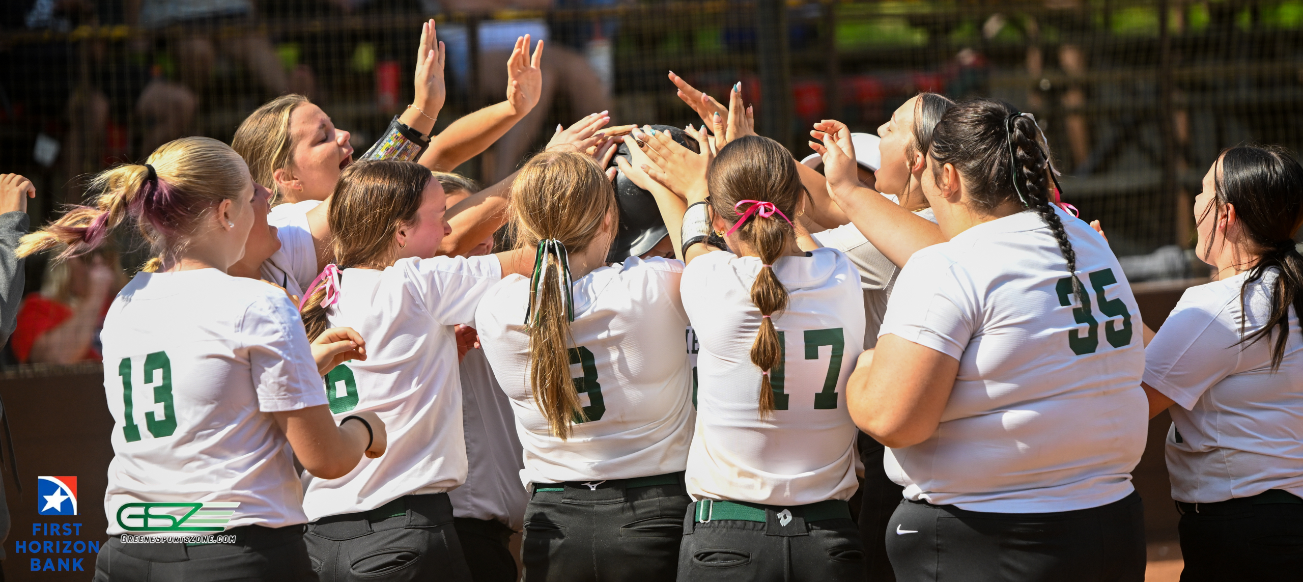 Two Wins Put Lady Huskies In Tiny Day Championship Bracket